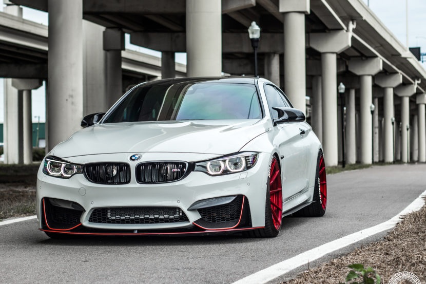 bmw m4 with 702whp and bright brushed red wheels